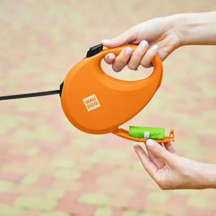 Повідець-рулетка для собак WAUDOG R-leash з контейнером для пакетів, світловідбивна стрічка, L, до 40 кг, 5 м, помаранчевий — Фото 3